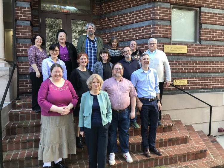 RSC at ALA Washington Office on 11 November 2024. Standing on steps outside the building. Back row: Angela Quiroz, Ahava Cohen, Szabolcs Dancs, Charlene Chou, Anne Welsh. Middle row: Elisa Sze, Jessica Grzegorski, Colleen Barbus, James Hennelly, Robert Maxwell. Front row: Charlotte Christensen, Renate Behrens, Damian Iseminger, Christopher Holden.